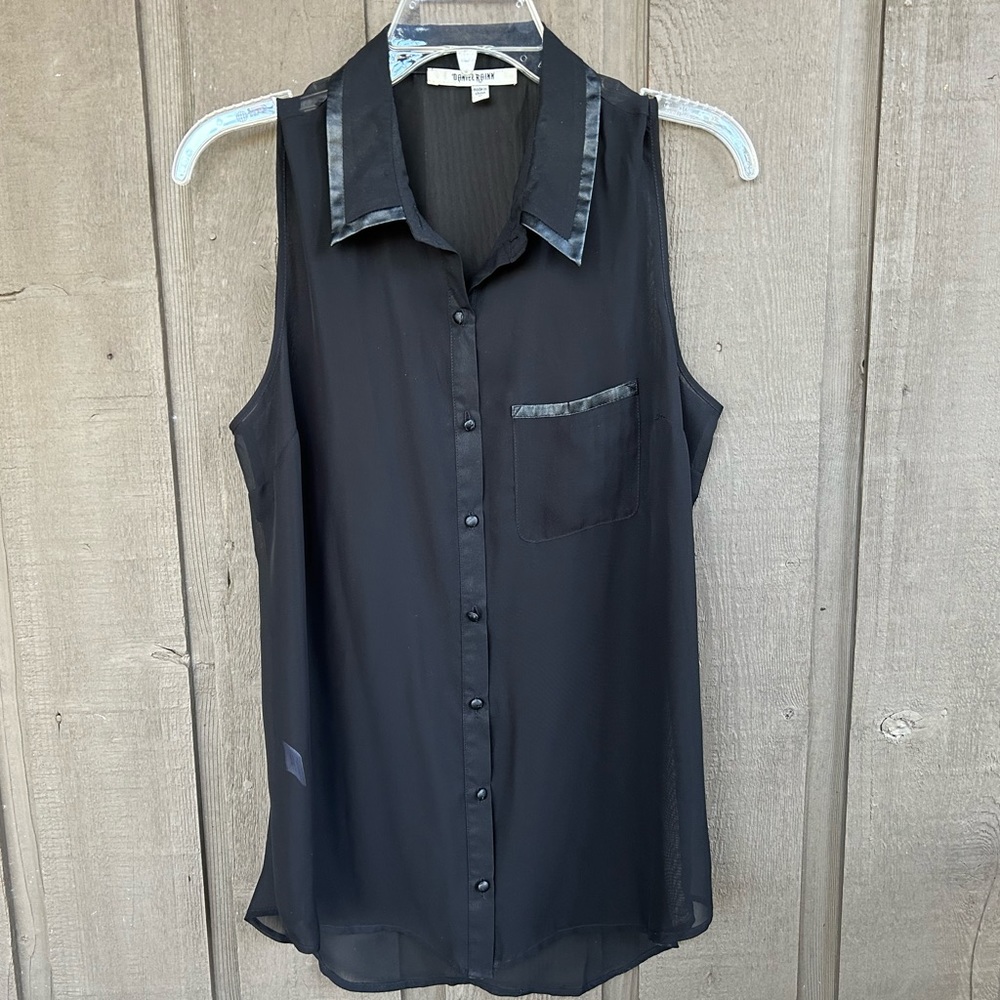 Black sheer blouse with imitation leather trim on collar and top of pocket